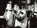 two men singing